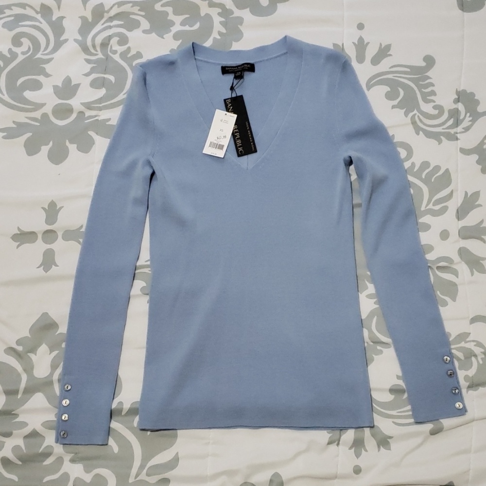 Banana Republic 100% merino wool.